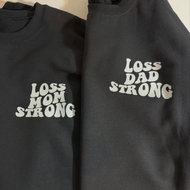 Sweet mama Krystal got matching shirts with dad, and they have the ATOT logo on the back. Literally obsessed with how cute these are 😭